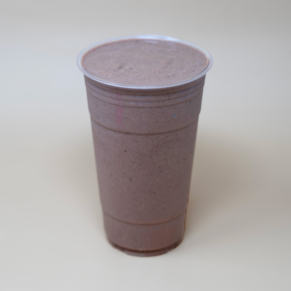 Chocolate Keto Smoothie in 24 oz togo cup. Almond milk, avocado, MCT oil, monkfruit, coconut meat*, cocoa, cacao nibs*, himalayan salt, cashew butter.