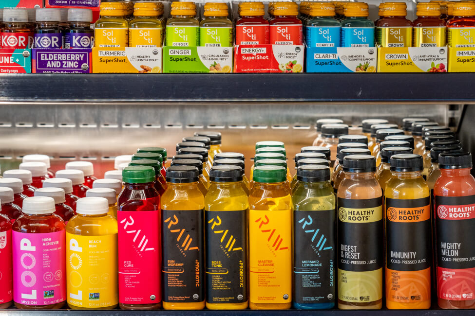 To go fridge stocked with cold pressed juices and wellness shots