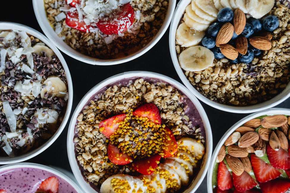 Shot of 6 smoothie bowls from above