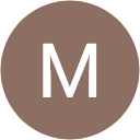 The letter M on a brown background representing the user Maddy