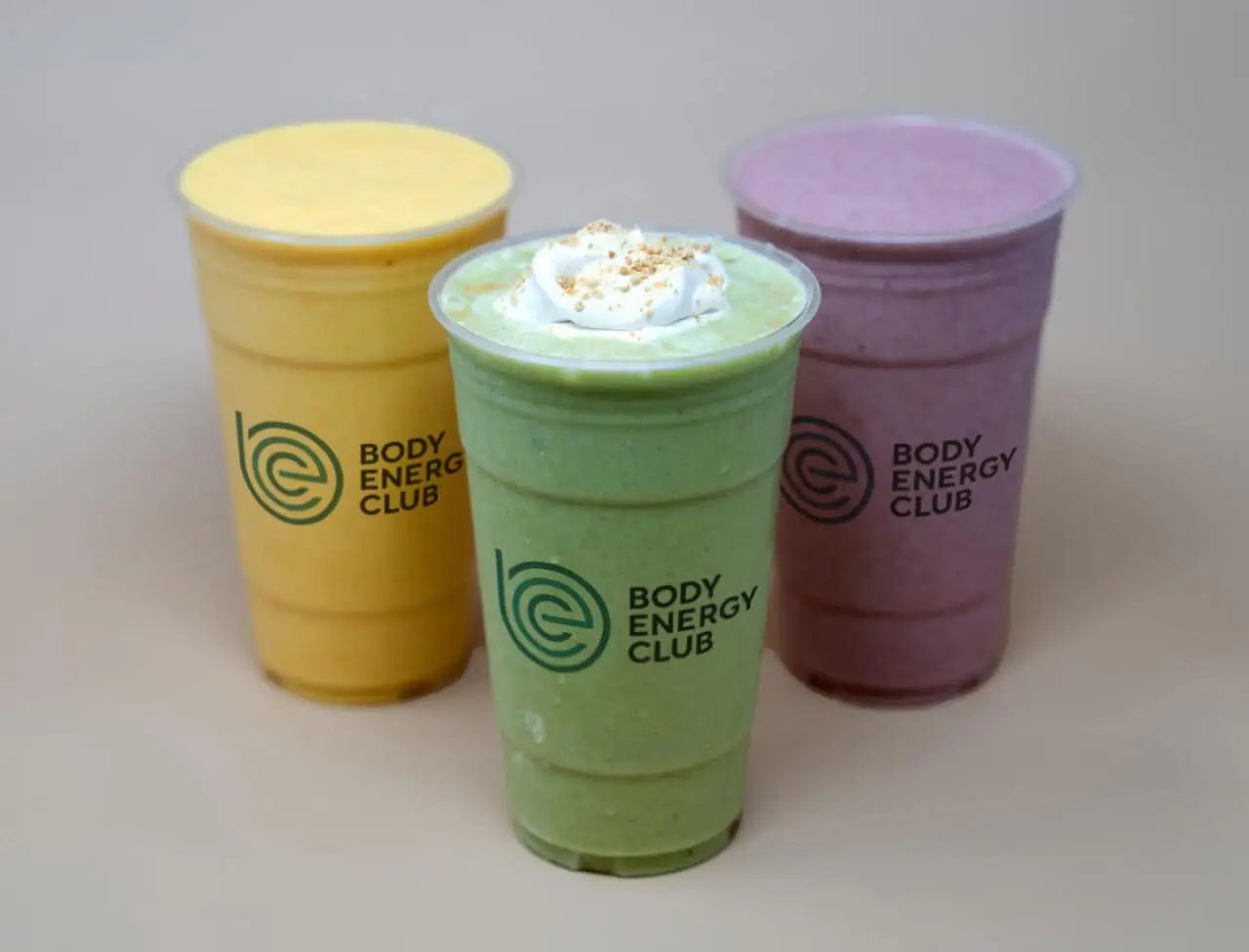 Displaying three smoothies, the Green Goddess, Banana Berry Blast, and Berry Delicious.